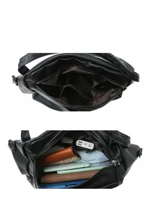 Interior detail of large leather tote bag showing spacious compartments and zip pocket