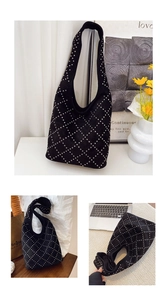 Detail of black suede hobo bag with silver stud grid pattern and wide shoulder strap