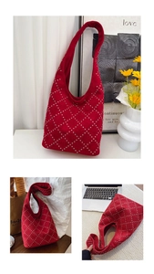 Detail of red suede hobo bag with silver rivets and diamond-patterned studs