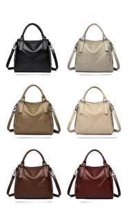 Multiple color options for textured leather handbags with cross stitching details