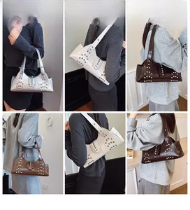 Détail des sacs à main à rivets en cuir argent blanc marron et café pour femmes