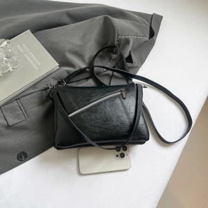 Retro black PU leather crossbody bag with silver zipper and textured finish for women