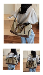 Detail of olive canvas travel bag featuring brown leather trim and adjustable shoulder strap
