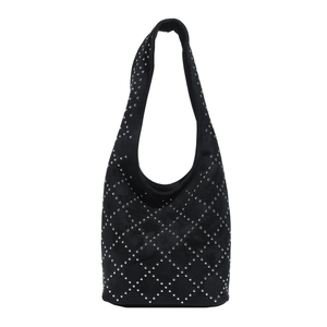 Punk style black bucket bag with silver studs and diamond quilted pattern on shoulder strap