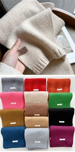 Detail of 100% wool knitted scarf showing texture and 12 colorful color options
