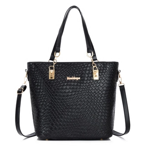 Black large capacity tote bag with embossed pattern, gold chain and adjustable strap