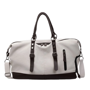 Large capacity canvas and leather travel duffel bag with shoulder strap and handles