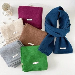 Chic 100% wool knit scarves for women in various colors for winter warmth