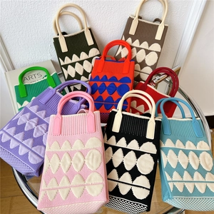 Mini knitted tote phone bags in assorted colors with textured shell weave patterns