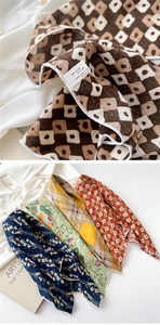 Detail of cotton linen scarf showing premium stitching and elegant floral pattern prints