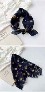 Detail of navy blue cotton linen square scarf with vintage floral print and white border