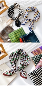 Detail showing various patterned cotton linen scarves with geometric and stripe prints