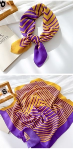 Detail of soft cotton linen square scarf featuring vibrant yellow and purple stripes