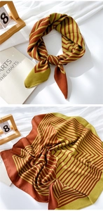 Detail of vintage geometric herringbone cotton linen scarf with soft diagonal texture