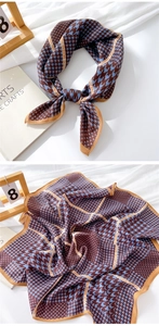 Detail of cotton linen scarf with houndstooth pattern and Modern Fashion lettering