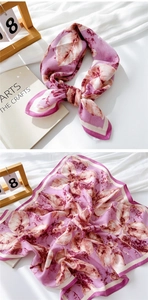 Detail of purple cotton linen square scarf with floral print and beige edge stitching