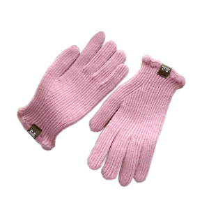 Pink knitted winter gloves with ribbed cuffs and fashion decorative leather patch label
