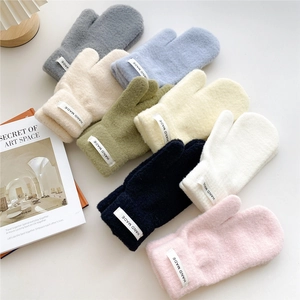 Chic thick knit mittens for women in multiple colors with handcrafted woven labels