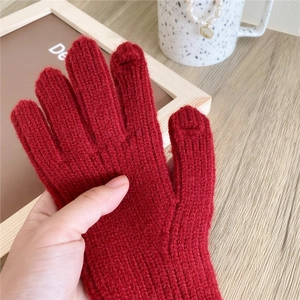 Red knit touchscreen gloves for winter with warm ribbed texture and stylish design