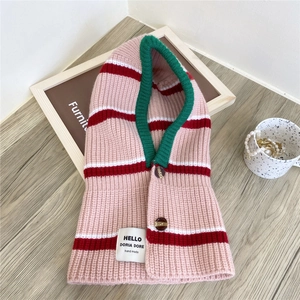 Detail of pink striped knit hooded scarf with green ribbed trim and brown buttons