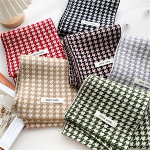 Classic houndstooth knitted scarves in multiple colors with a soft thick texture