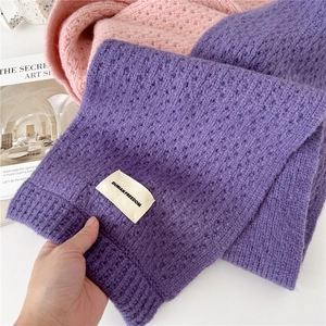 Soft knitted solid scarf in purple and pink with hollow crochet texture for winter