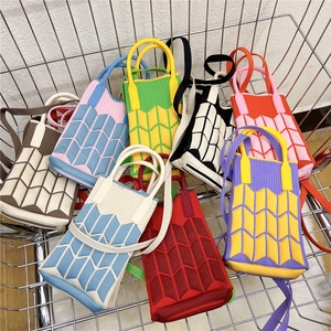 Mini knitted crossbody mobile phone bag with colorful wave patterns and top handles