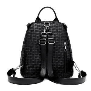 Black woven textured backpack with adjustable straps and rear hidden zipper pocket