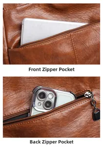 Detail view of brown leather tote showing front and back zip pockets with tablet and phone