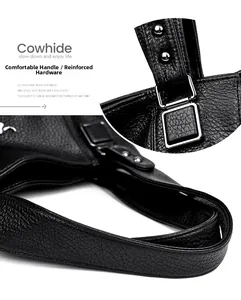Detail der schwarzen Litschi-Rindsleder-Textur mit robuster silberner Hardware und Nähten
