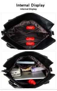 Detail der geräumigen Innenfächer der schwarzen Lederhandtasche mit mehreren Steckfächern