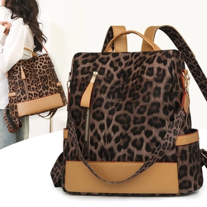 Sac à dos femme à imprimé léopard élégant avec bordures en cuir et grand compartiment