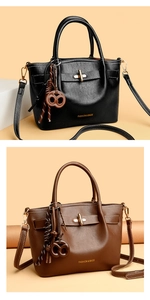 Detail view of vintage PU leather tote bags with metal buckle and pretzel charm