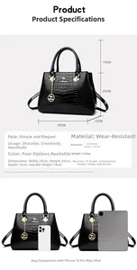 Size guide for crocodile pattern handbag with dimensions 29x25x13cm and capacity view