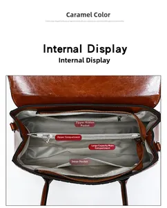 Vue intérieure du sac à main en cuir caramel avec compartiment principal et poche zippée