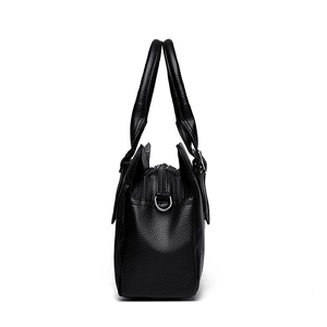 Classic black litchi grain leather tote bag with multi-zipper layers and silver hardware