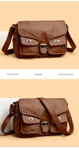 Detail of wave-textured brown cowhide leather bag with silver metal twist locks