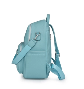 Side view detail of light blue leather backpack featuring silver zippers and side pockets