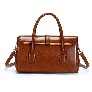 Sac à main vintage marron en similicuir avec bandoulière réglable et fini texturé