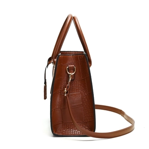 Structured dark brown croc-effect tote bag with top handles and detachable shoulder strap