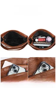 Detailed view of multi-pocket vintage bucket bag showing large storage capacity and PU leather