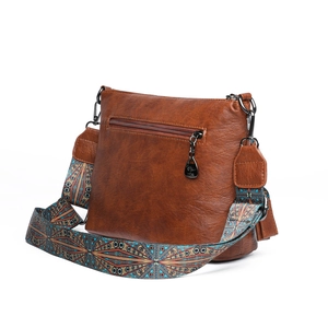 Vintage Umhängetasche aus braunem Leder mit bedrucktem Schultergurt und Reißverschluss