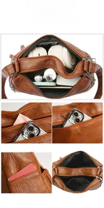 Detailed macro view showing the large capacity and multi-pocket interior of this retro brown bag