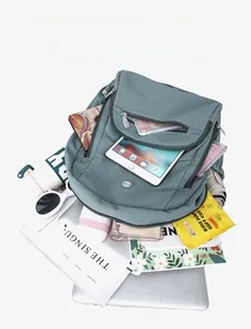 Détails de rangement du sac à dos en nylon pour tablette, livres et accessoires de voyage