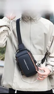 Detail of waterproof chest bag with integrated USB port and secure code lock feature
