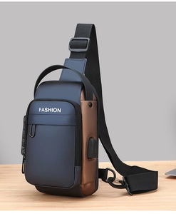 Detail of cross-body chest bag showing side anti-theft combination lock and USB charging port