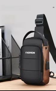 Detail of waterproof men's crossbody chest bag with USB port and anti-theft combination lock