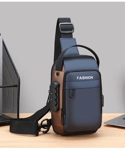 Close-up of a blue anti-theft chest bag featuring a mechanical combination lock and USB port