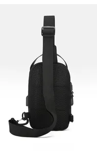 Breathable honeycomb mesh back on black men's crossbody bag with external USB port