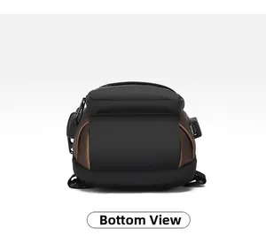 Detail of crossbody bag bottom with USB charging port and breathable mesh padding